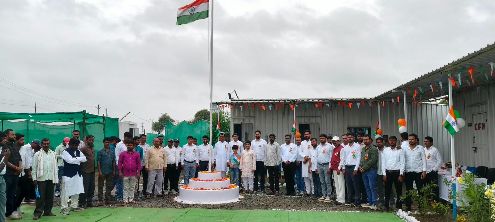 Panoramic group photograph of Sunrise Constructions team, engineers, and site crew gathered together